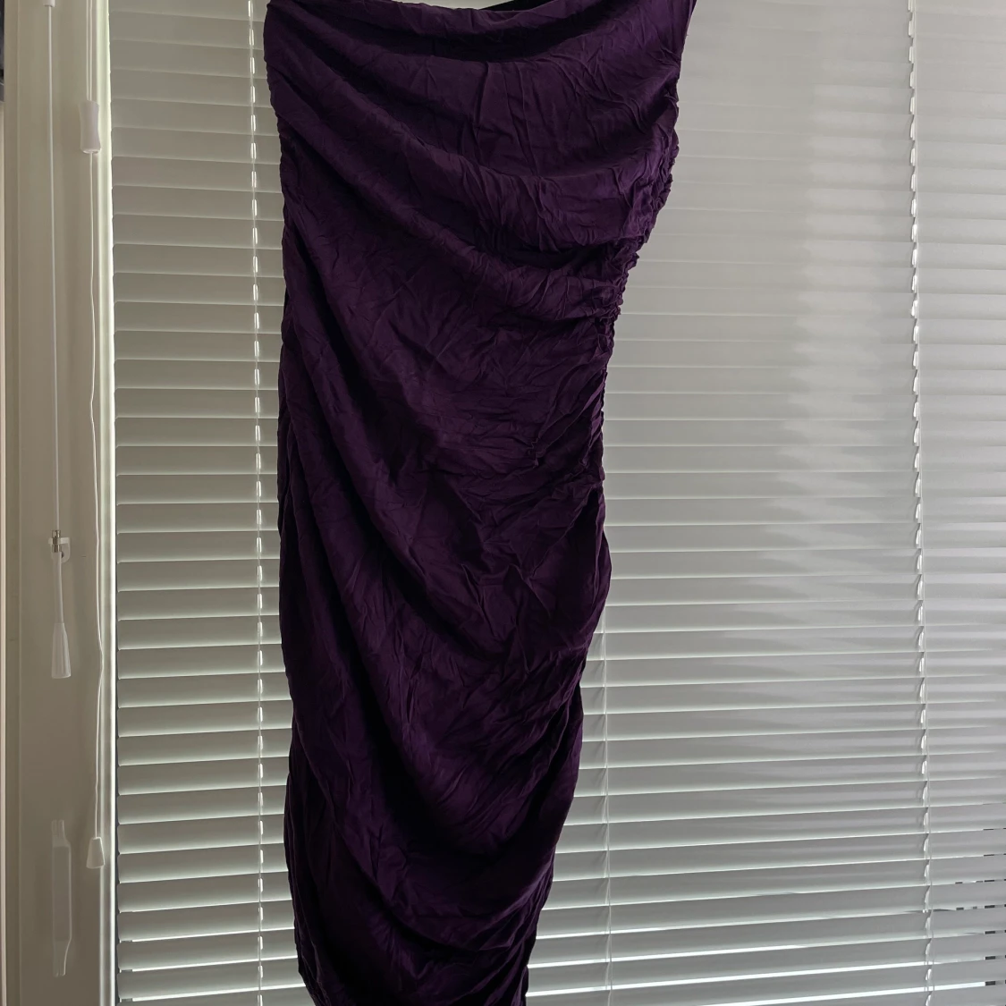 Tajt tubklänning i storlek S