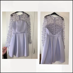 Klänning - Ljus lila klänning , använt 1 gång , storlek 34-36 . Nyskick
