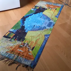 A never worn Van Gogh Scarf depicting his famous 