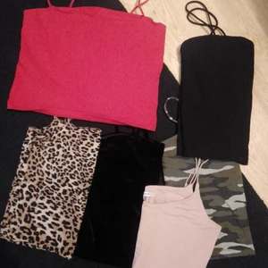 Linnen/toppar  - Korta linnen/toppar, samtliga i strl L, 4 styckna är ifrån Gina, 1 från chiquelle och 1 från 77thFlea. Knappt använda! Den svarta brevid leopardlinnet är i velour. Och den brevid den röda i bomull.  Samtliga för 266 inkl spårbar frakt, kan även dela på dom för 50kr plus frakt.