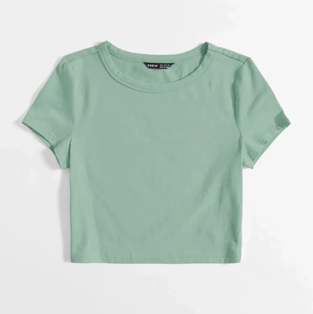 Mint grön t-shirt/topp, aldrig använd, jätteskönt material.. Toppar.