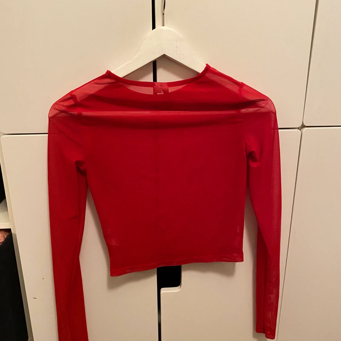 Nelly genomskinlig tröja XS