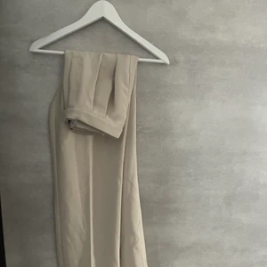 PANTS NAKD - Beige pants from NAKD 