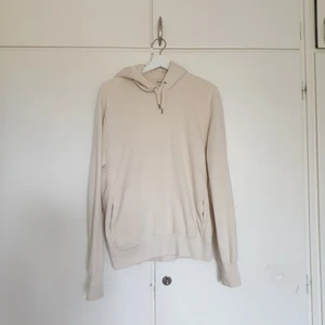 Hoodie Uniqlo Strl S - Beige hoodie från Uniqlo strl M, fint skick. 