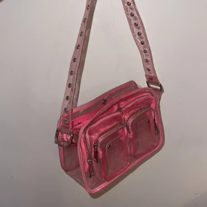 Nunoo bag  - Used bag pink plastic nunoo - 
