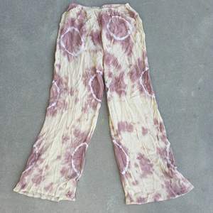 Lightweight tie-dye bohemian pants with wide leg, so comfortable and breezy. Hand dyed in Bali! They have elasticated band and can be high waisted or low waisted depending on your style. See my other listing for matching kimono