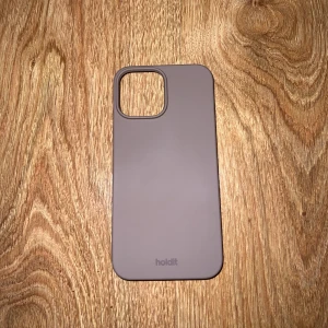 Hold it skal iPhone 13pro max  - Helt nytt skal från Hold it! Endast provat 