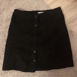 Jeanskjol - Jeans kjol i strl 38, använd en gång 