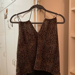 Mango Leopard Print Top Size M - Wore this for going out. It is in good condition, no marks or stains. Bought this from Mango 3 years ago.