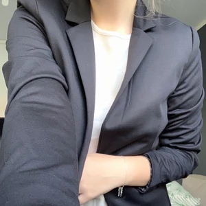 Kavaj  - Fin kavaj i bra skick. Köparen står för frakt 