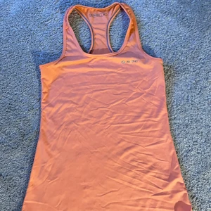 Träningslinne SOC - Träningslinne från SOC, neon orange i storlek 36