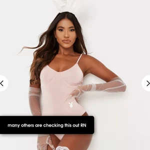 Halloween kostym - Helt ny med prislapp kvar, det som ingår är öronen och bodyn!!