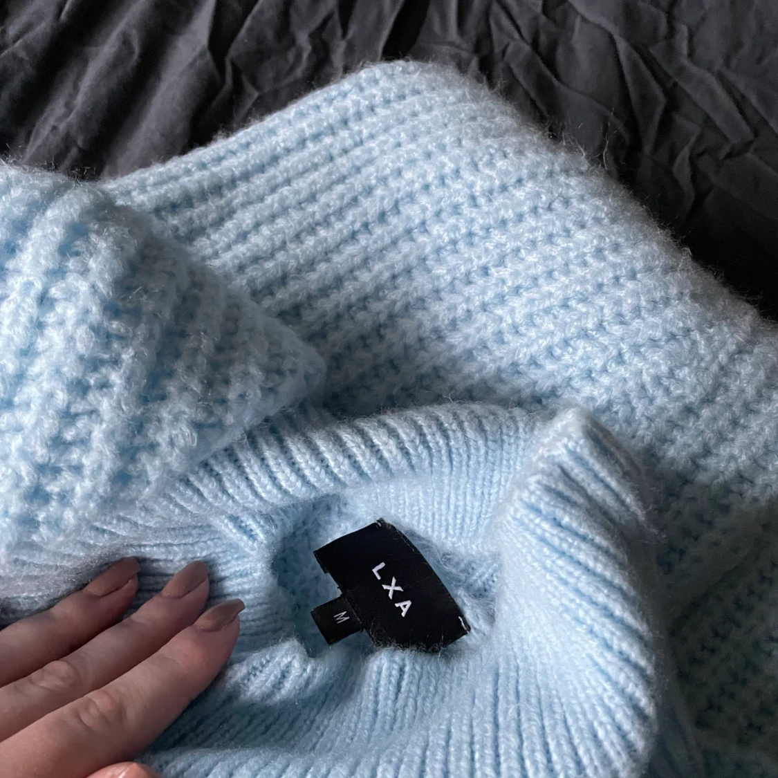 Ljusblå stickad tröja