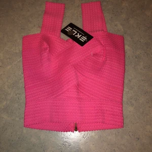 Topp xs/s - Rosa topp i storlek xs/s. Aldrig använt. Hämtas i malmö/oxie 