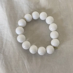 Pärl armband - Ett 70-tals armband som är stretch