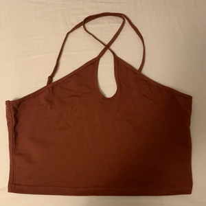 Brunt linne - Ett brunt linne som aldrig är använt. Storlek M/L