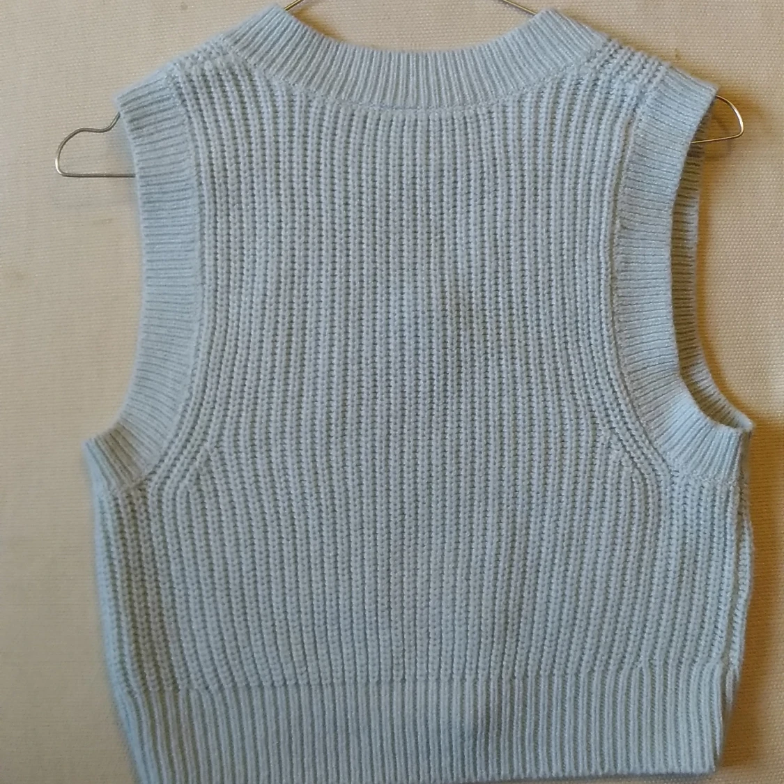 Ljus blå väst - 91