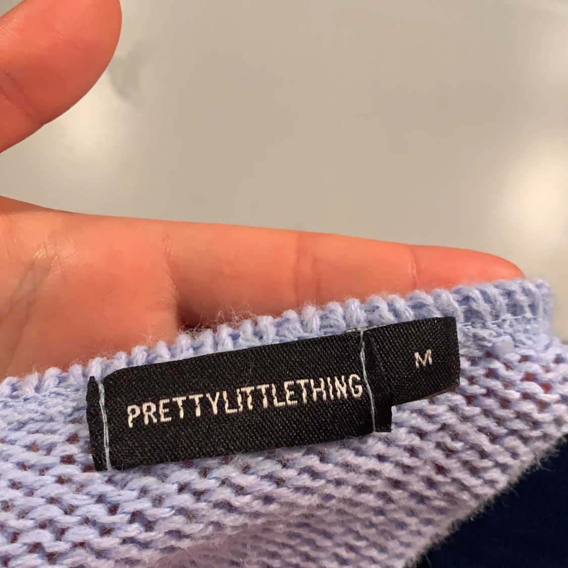 Blå stickad kofta - 91