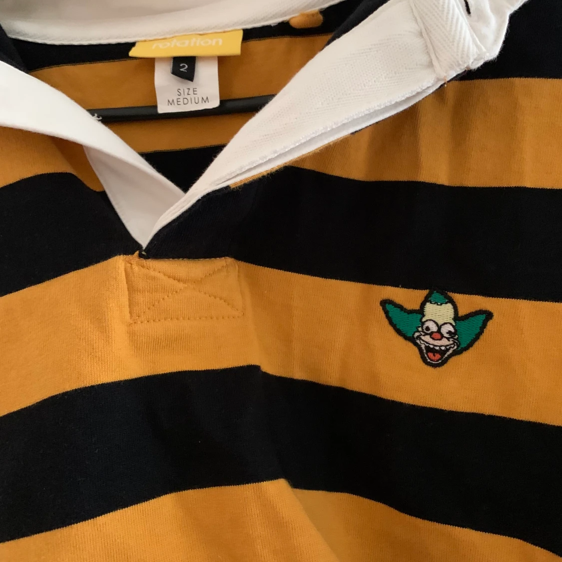 Kort Simpson tröja med krage 