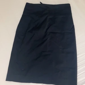 Kostym kjol till låren/knäna - Pencilskirt