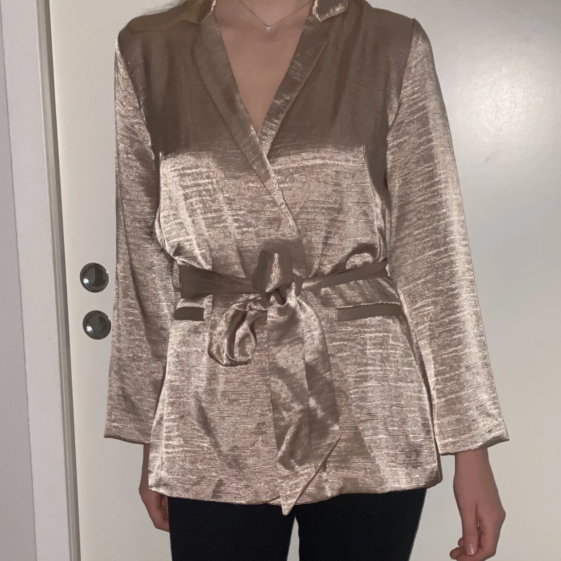 Kavaj i skimrande rosé