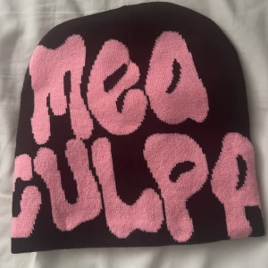 Mea culpa mössa  - Ej använd 