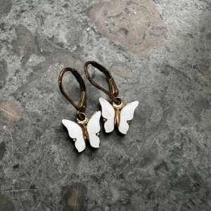 Fjäril örhängen  - Använda 