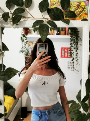 Calvin Klein white t-shirt  - Selling because it does not fit me anyome. 