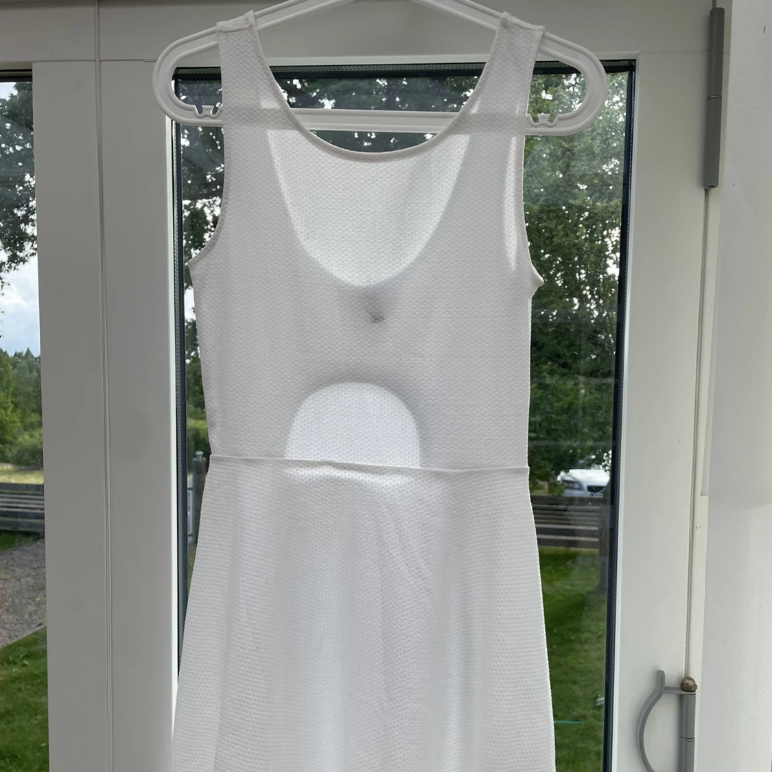 Vita sommarklänningar