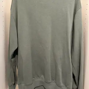 En HM sweatshirt som har använts ett par gånger men ser lika fin ut. 