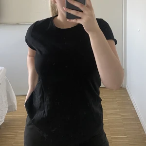 T-shirt  - Tightare m eller lösare s 