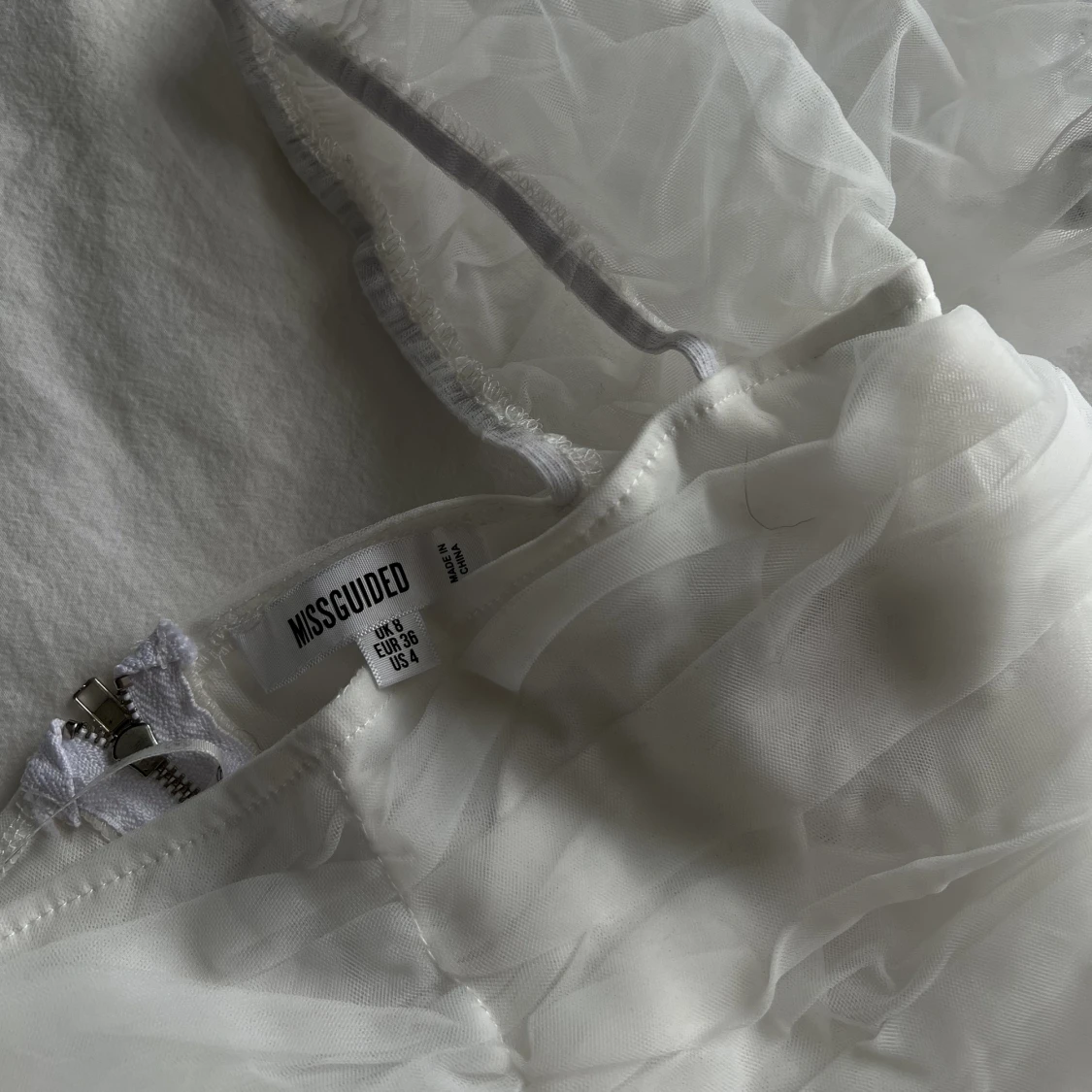 Croptop med meshärmar  - 90