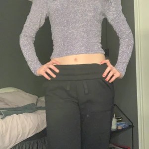 Glitter tröja lila  - Använd en gång  