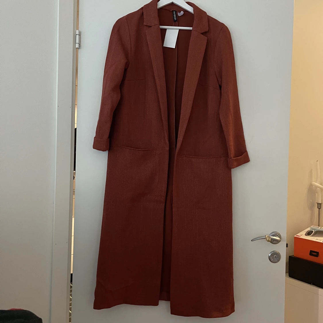 Rostfärgad tunnare kappa S