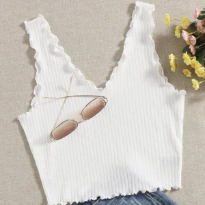 Vit topp  - En vit kort topp perfekt för sommaren. Knappt använd