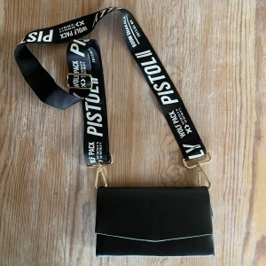 Elly pistol väska - Elly pistol väska. Perfekt för utgång. 90kr