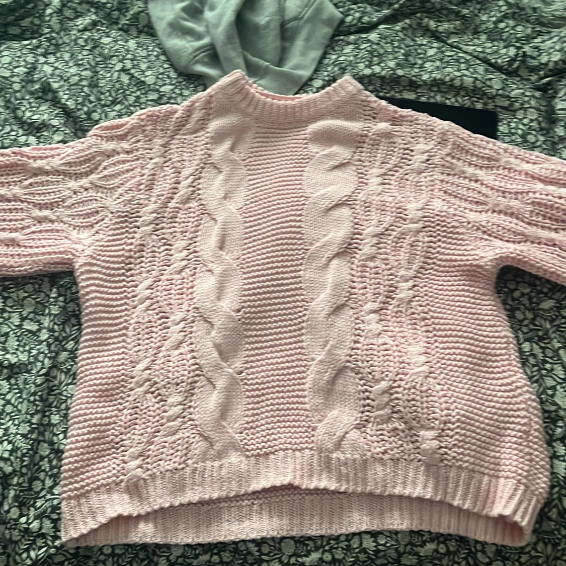 Rosa stickad tröja