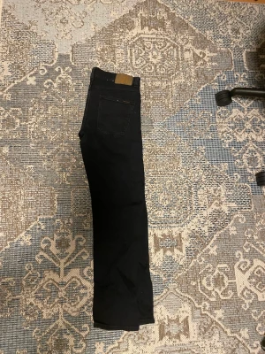 Nudie jeans  - Nudie jeans som är använda en gång så är som i nyskick Pris kan diskuteras