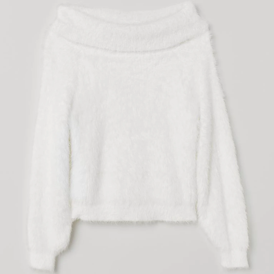 Vit stickad tröja
