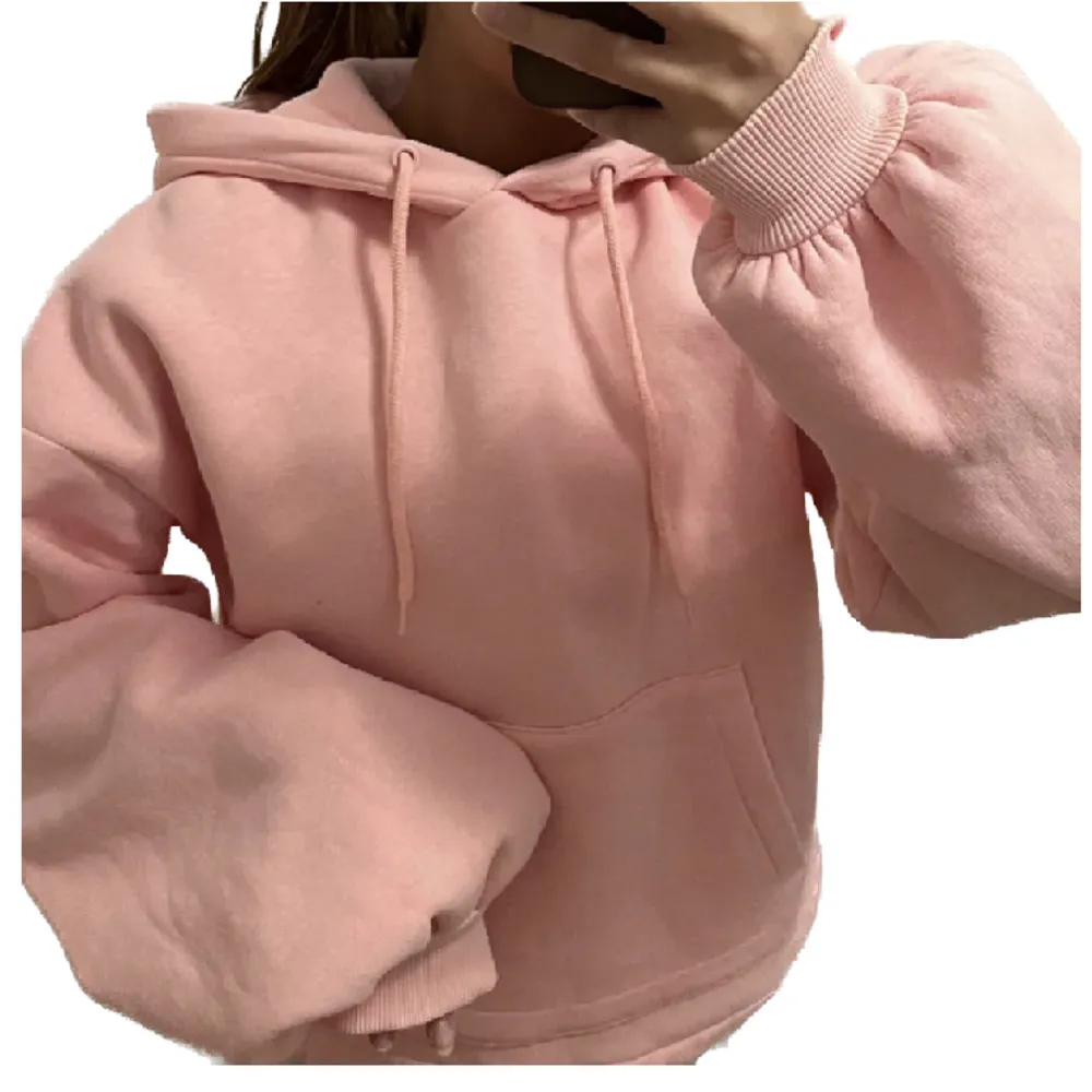 rosa hoodie med ballongärmar från NA-KD (Hanna Schönbergs kollektion) aldrig använd, dock en  omärkbar defekt efter tvätt, se bild 3!  !!Frakt tillkommer!! . Hoodies.