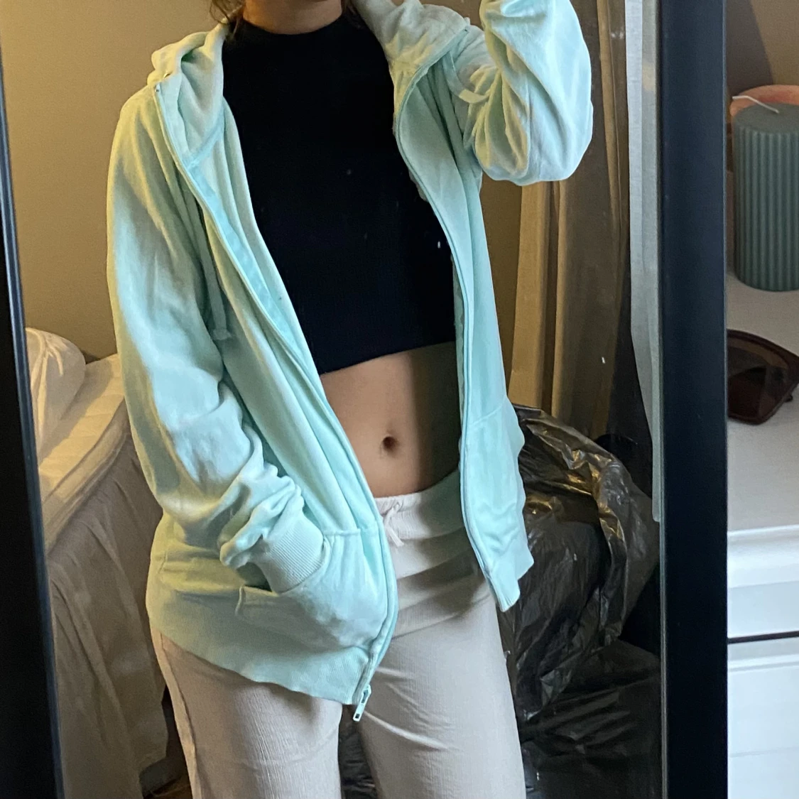 Blå kofta med hög krage