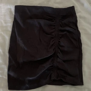 Kjol  - En kort kjol 