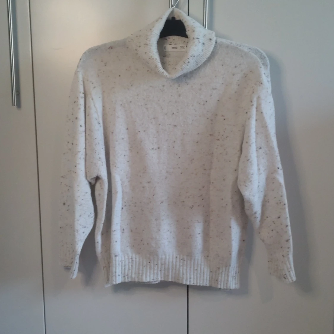 Stickad tröja med tubkrage stl xs