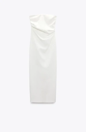 Klänning - Klänning i nyskick säljes i strl S/36