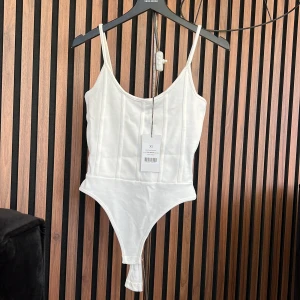 Body  - En superfin body som aldrig kommit till användning. Lapparna kvar! 