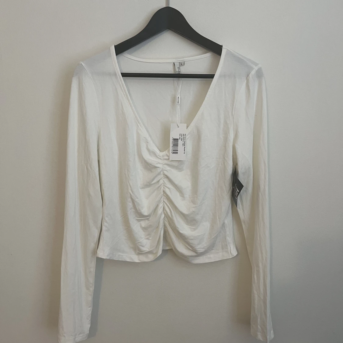 Vit topp från Nelly