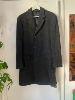 Tiger rock - 100% ull, använd ett fåtal ggr. Mörkgrå