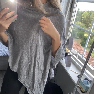 Poncho - Grå
