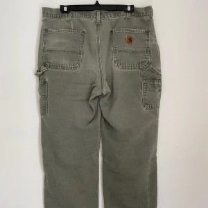 Vintage carhartt  - Ska sälja mina vintage carhartt byxor, vill du veta mer om mått så fråga och pris kan diskuteras 