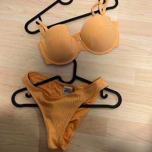 Adjustable bra like bikini set. Supported bra and adjustable waste and shoulder strap for bra. Top and bottom included!!!
